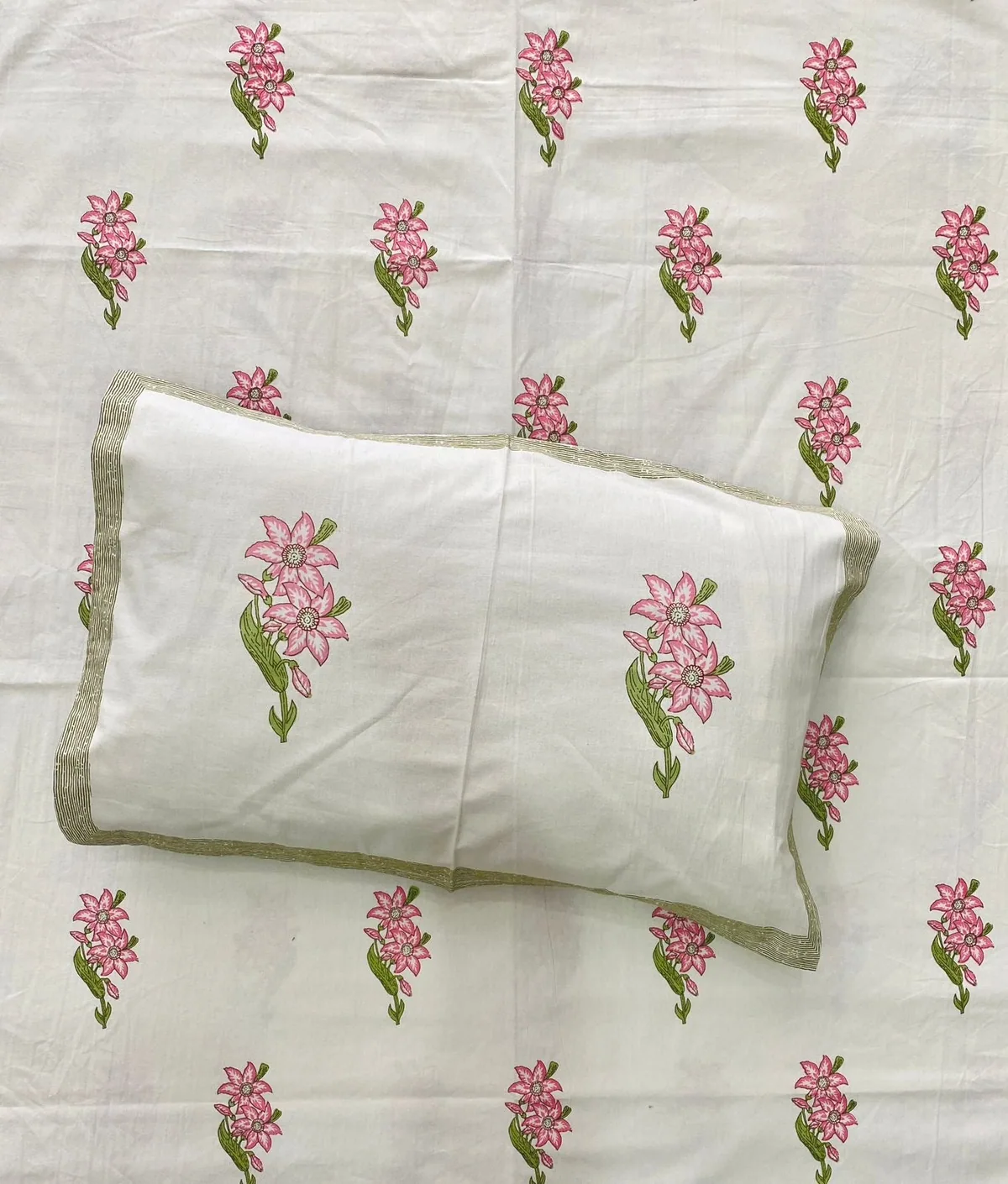 Full view of pink floral bedsheet