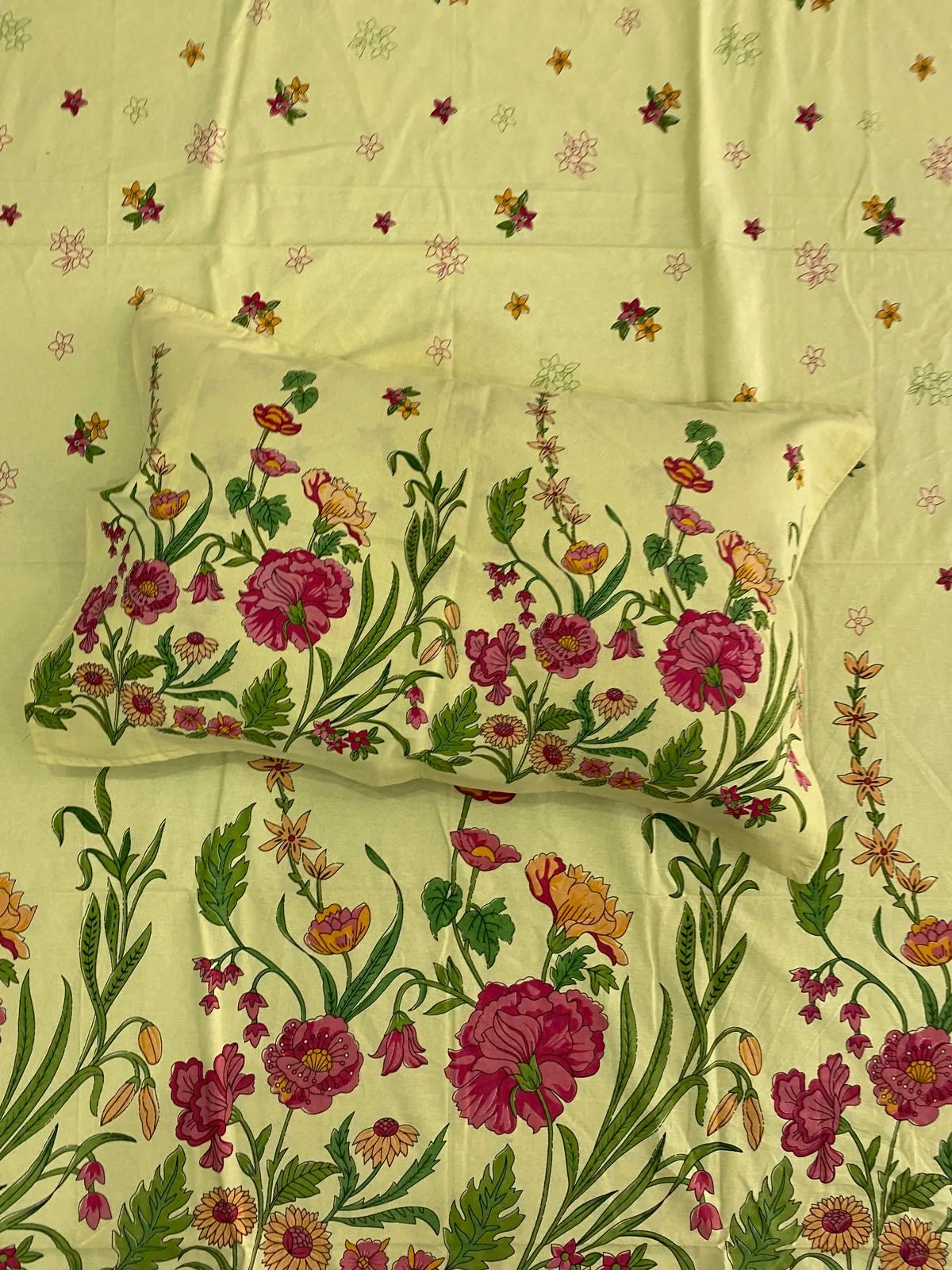 Full view of yellow floral bedsheet