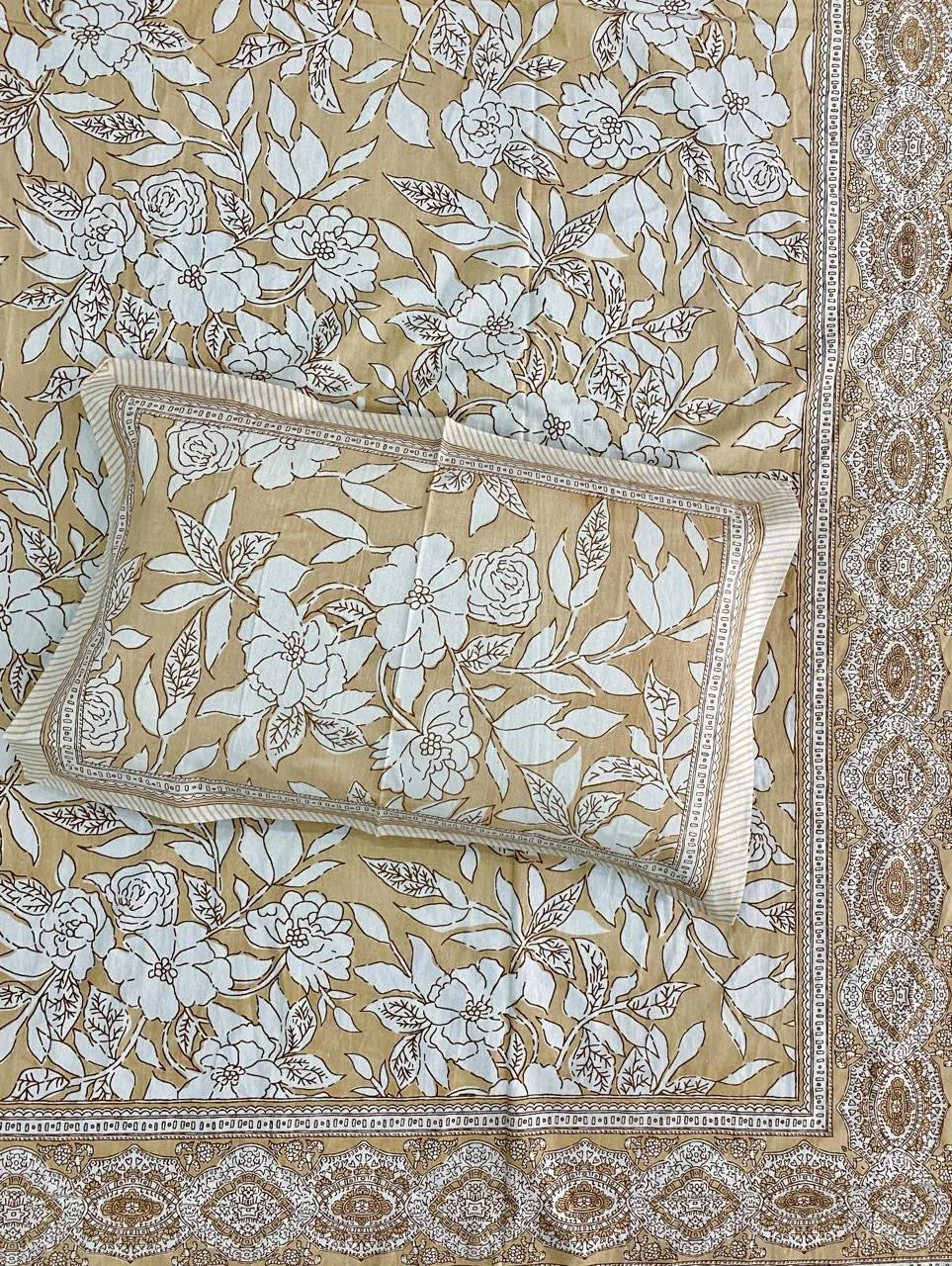 Full view of peach floral bedsheet