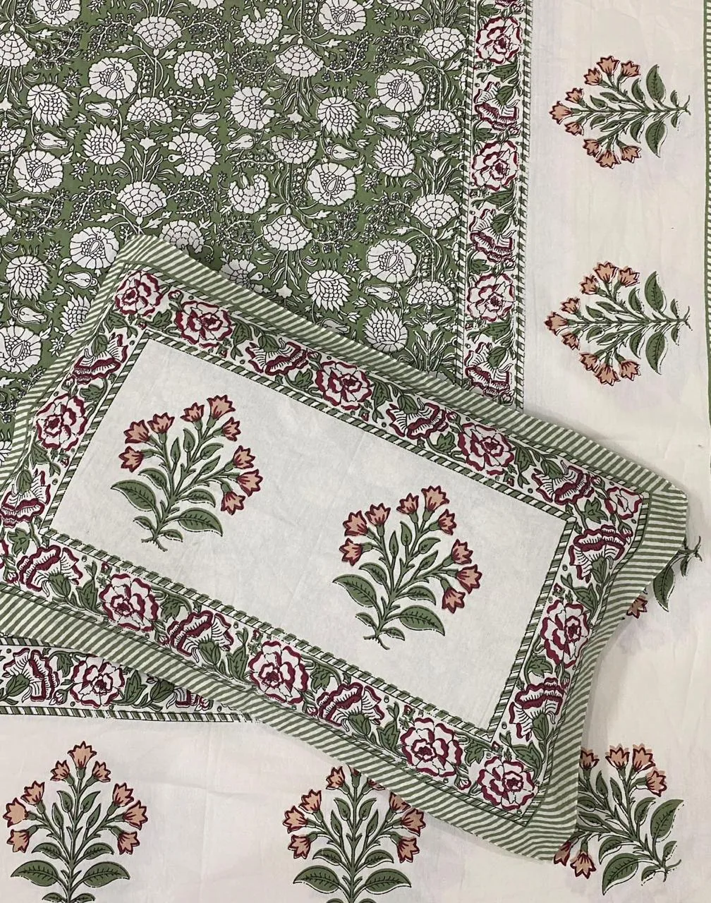 Full view of green floral bedsheet